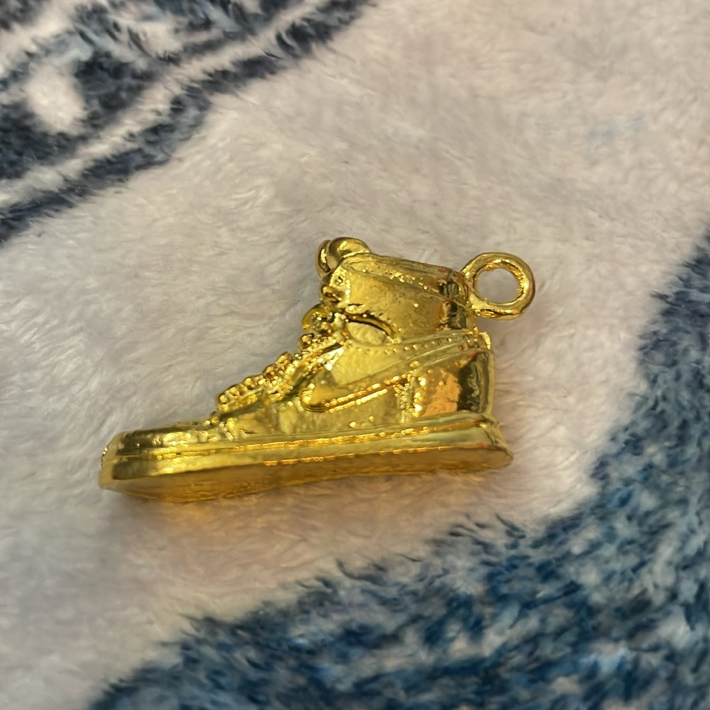Brand new gold Nike shoe pendant
